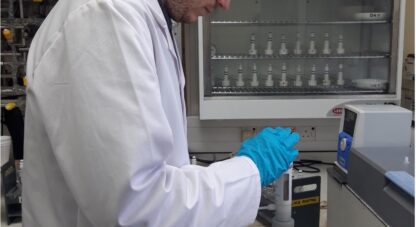 Harvey preparing carbonate samples to be reacted with phosphoric acid to produce CO2 for isotope analysis